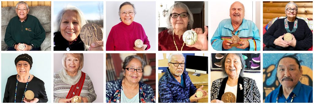 12 Indigenous Elders, each holding the Guthrie Award Medal they received