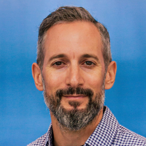 Man with short salt and pepper coloured hair and beard